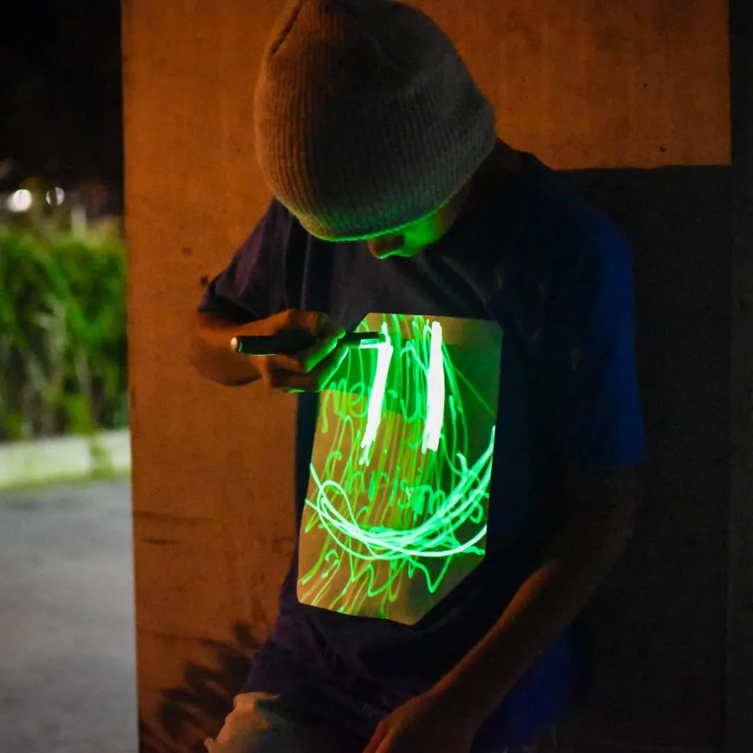 Illuminated Apparel Original Interactive Glow in The Dark T-Shirt - Fun for Birthday Parties & Festivals